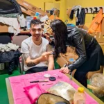 Una ragazza sta truccando il viso di un ragazzo durante il Carnevale 2026 di ELO Epilessia Lombardia ETS